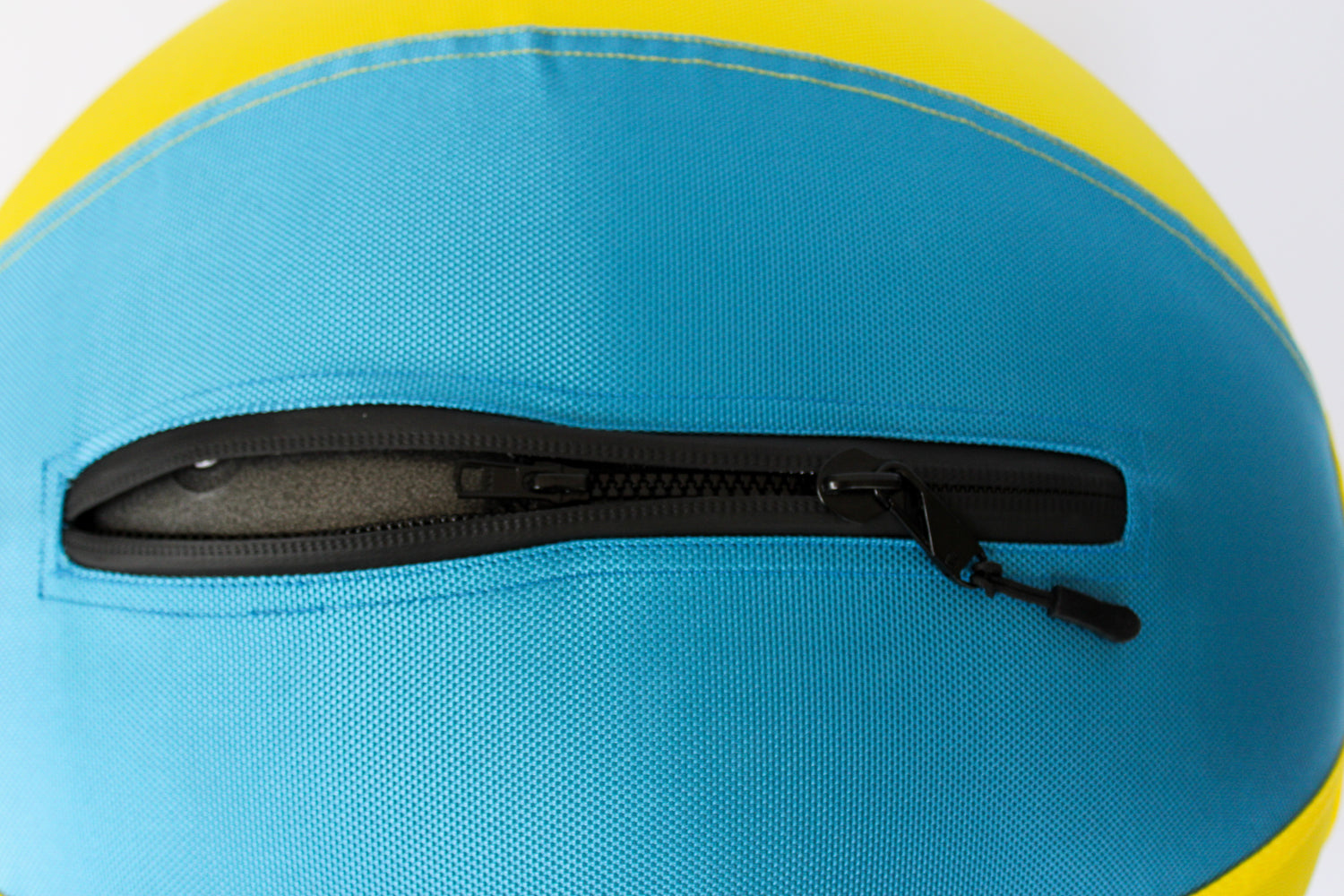 View of the herding ball Bosty Ball MAX’s double-zipper closure partially zipped, highlighting reinforced stitching and durability.